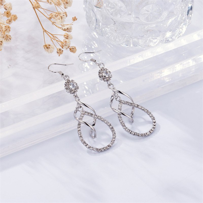 LOFTILY女款创意时尚雪花水滴造型代白锆石耳环饰品气质_主图-2 Sparkling Snowflake Teardrop Zircon Drop Earrings | Luxury Copper Jewelry - Image 1