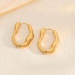 Trendy Sculpted Wavy Huggie Hoops | Everyday Luxury - Image 3